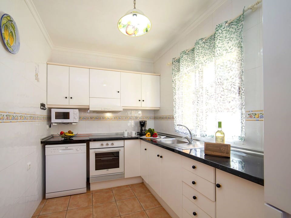 Kitchen, Kitchen Appliance, Countertop, Major Appliance, Cabinetry, Interior Design, Furniture, Flooring, Home Appliance, Home