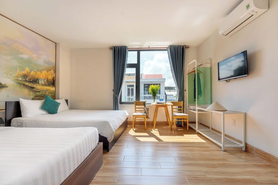 Family Room, City View | Minibar, desk, iron/ironing board (on request), WiFi (free)