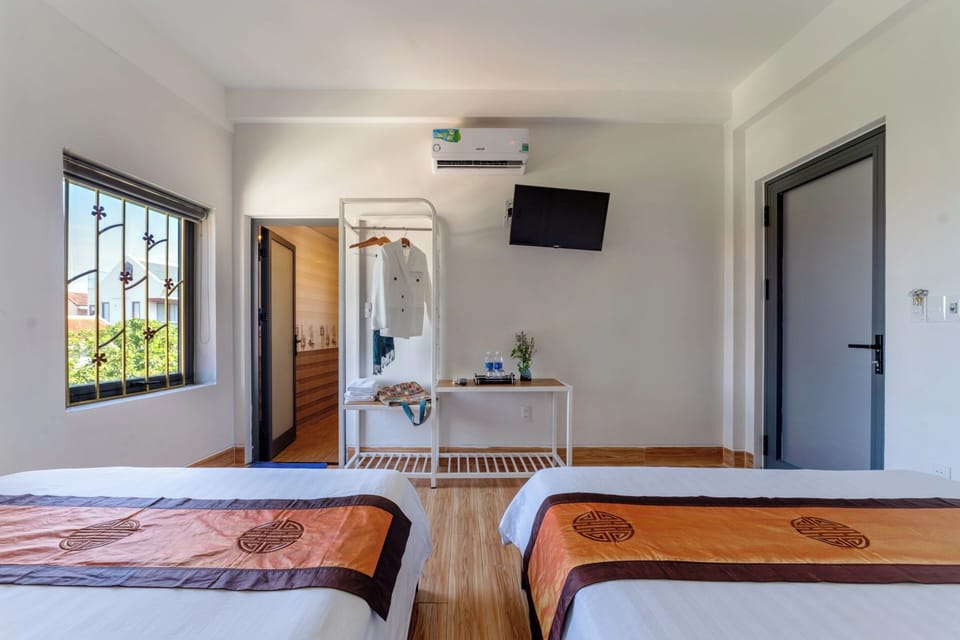 Family Room, City View | Minibar, desk, iron/ironing board, free WiFi