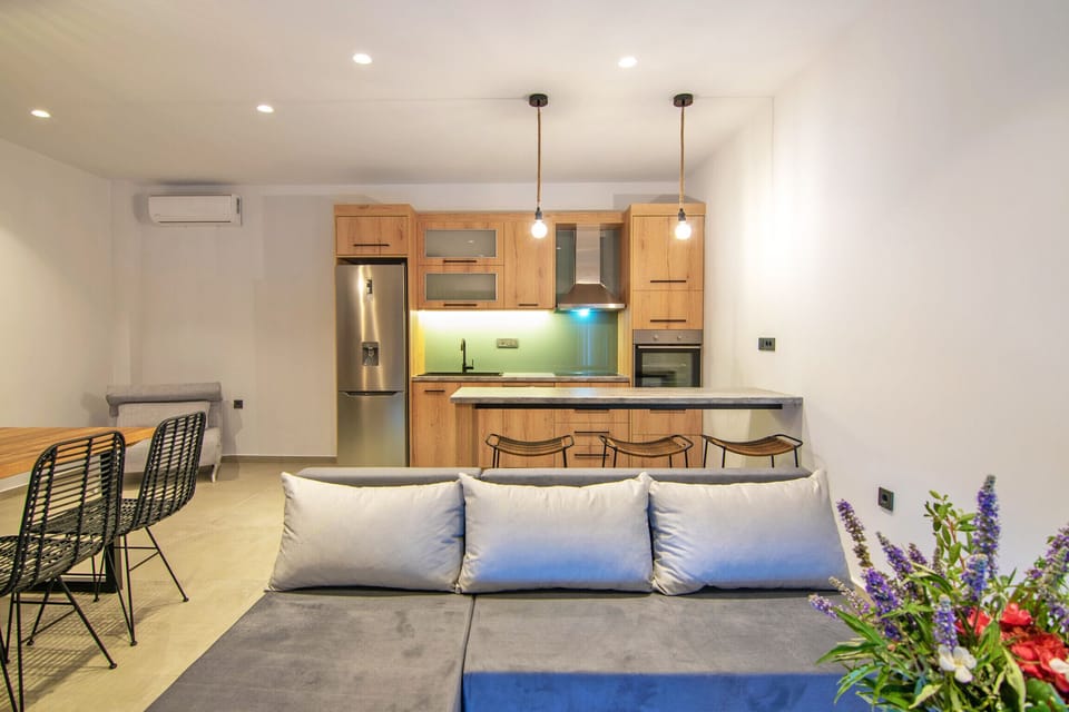 Fully equipped kitchen and living area of Spectacular Sea View Villa,Near Taverns & Sandy Beaches