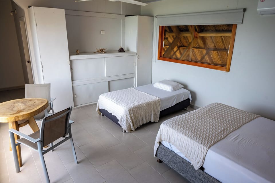 Deluxe Room, Partial Sea View | Select Comfort beds, minibar, in-room safe, individually furnished