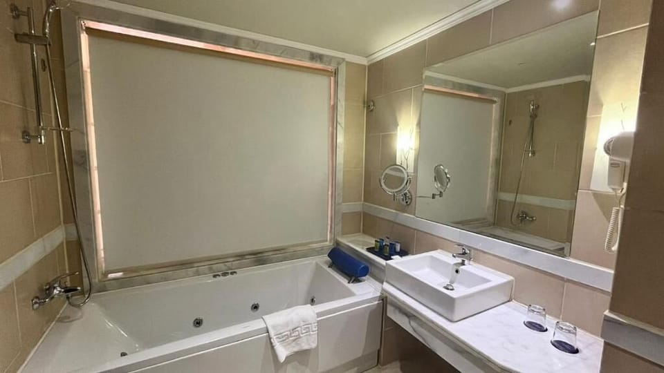 Jetted tub, slippers, towels