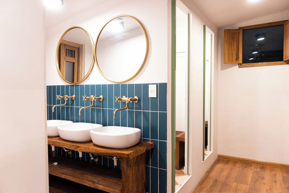 Shower, rainfall showerhead, eco-friendly toiletries, towels