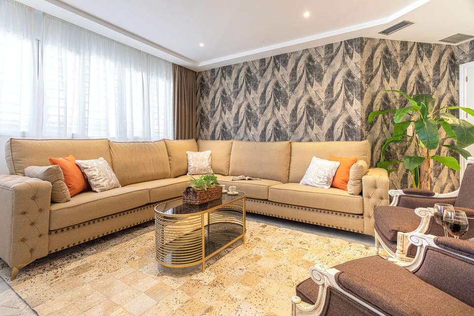 Apartment (3 Bedrooms) | Living area | 32-inch TV with cable channels