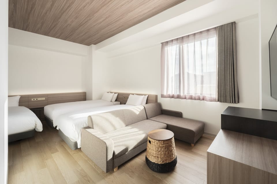 Quadruple Room, Non Smoking (28 sqm) | Down comforters, pillowtop beds, in-room safe, iron/ironing board