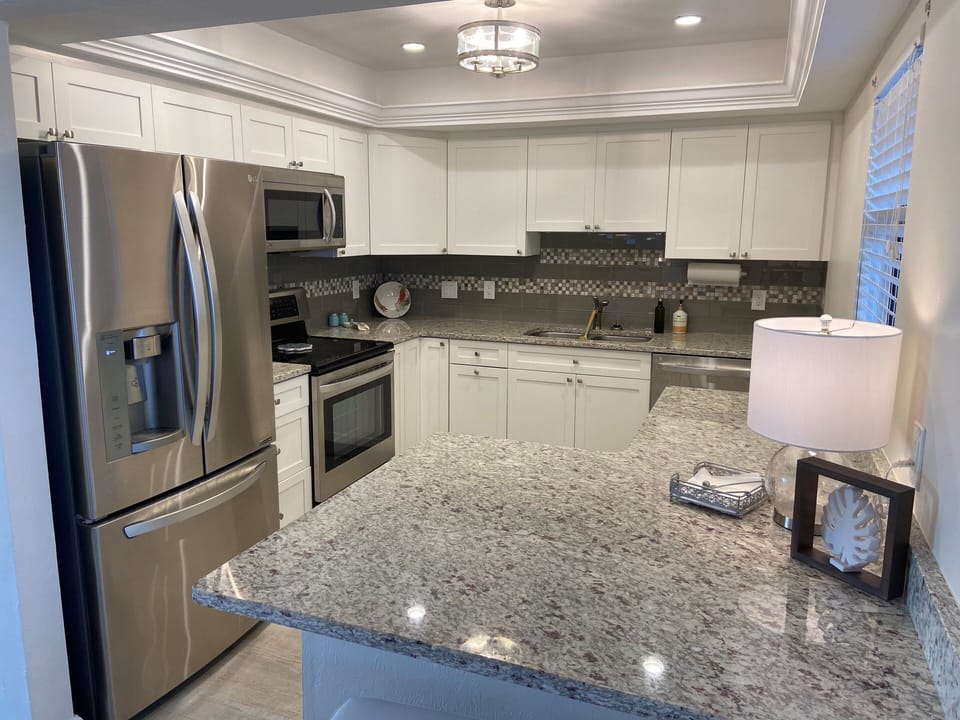 Kitchen with convection oven and stainless steel appliances