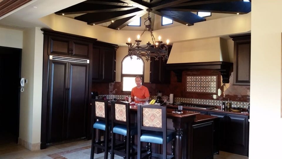 A fully equipped large chefs kitchen offers seating at the island & large pantry