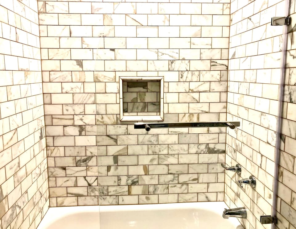Gorgeous calcatta marble full bathroom on the 1st floor 