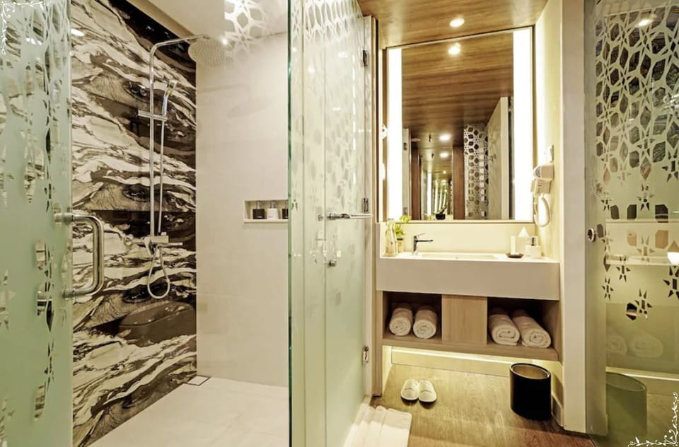 Shower, free toiletries, hair dryer, slippers