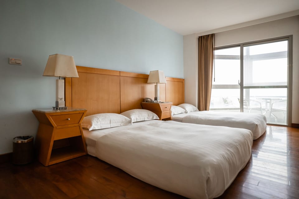 Family Deluxe Room w/ balcony | Down comforters, minibar, in-room safe, desk