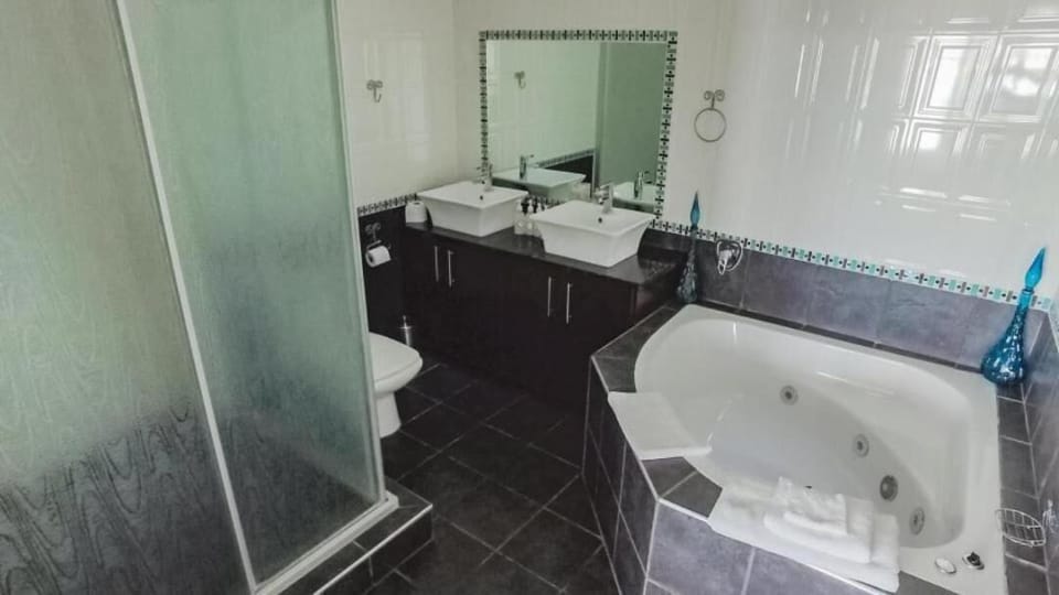 Separate tub and shower, deep soaking tub, towels, soap
