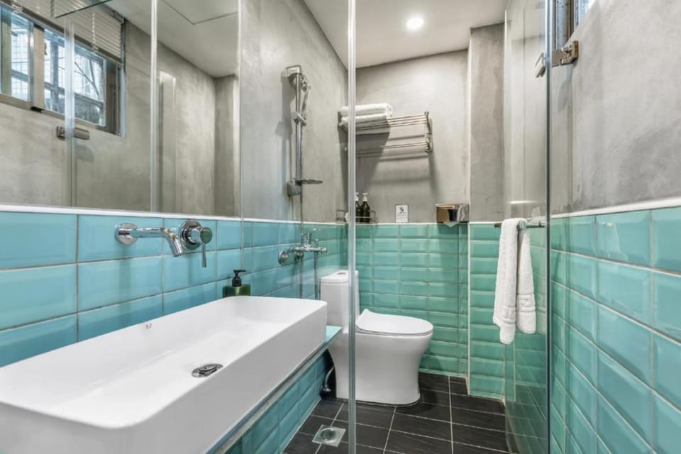 Standard Double Room | Bathroom | Shower, hair dryer, slippers, towels