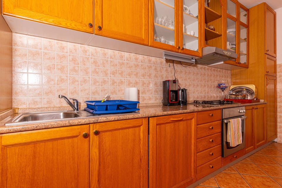 Apartment, 2 Bedrooms, Sea View | Private kitchen | Fridge, microwave, oven, stovetop