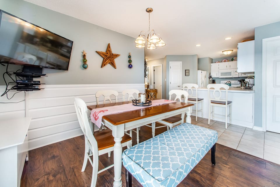 Dining room table with large flat screen