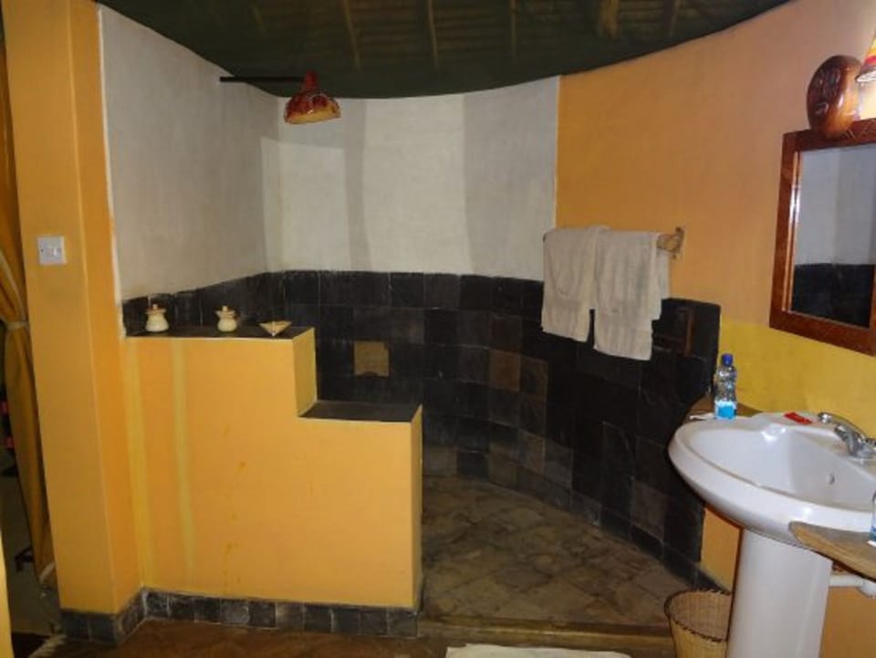 Standard Tent | Bathroom | Shower, rainfall showerhead, towels, soap