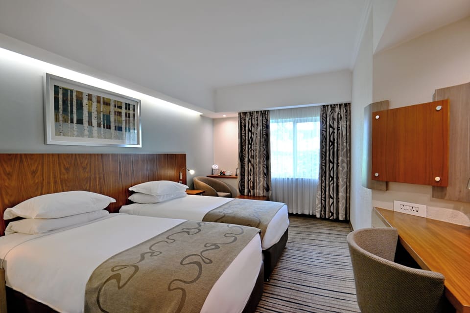 In-room safe, desk, iron/ironing board, free cribs/infant beds