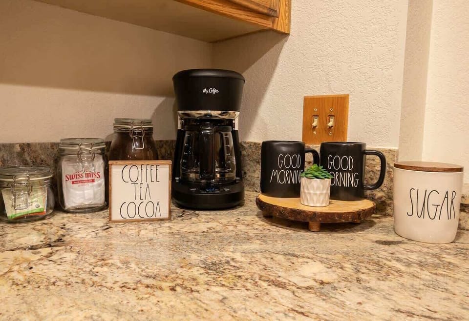 12-cup coffee maker and complimentary coffee, tea and hot cocoa.