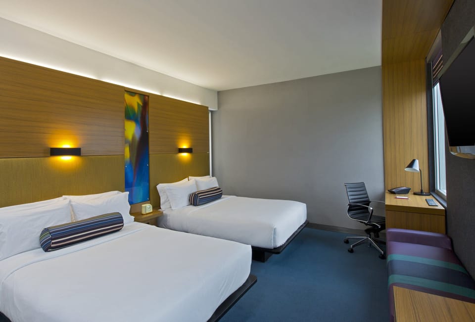 Premium bedding, in-room safe, desk, blackout drapes