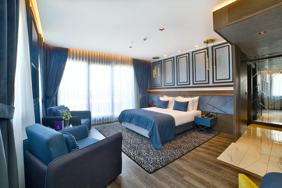 Deluxe Room, Terrace | Premium bedding, minibar, in-room safe, desk