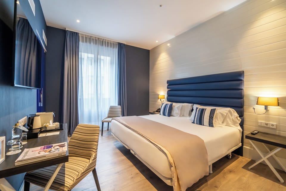 Premium bedding, down comforters, memory foam beds, minibar