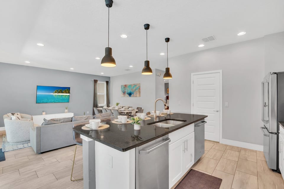 Airy Elegance: Experience the perfect blend of airiness and style in our living area, seamlessly connected to the open-concept kitchen for a chic and welcoming atmosphere.