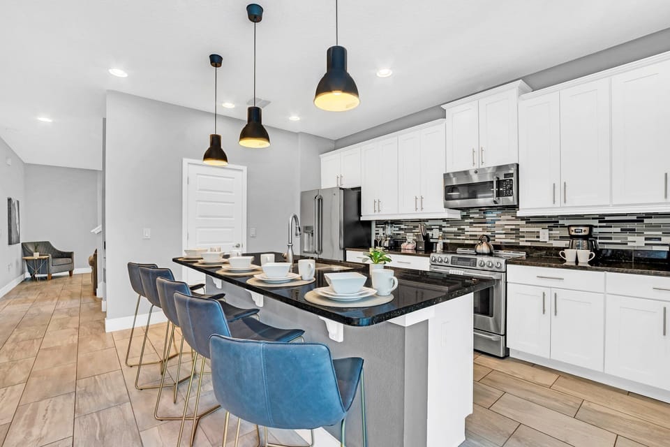 Airy Elegance: Experience the perfect blend of airiness and style in our living area, seamlessly connected to the open-concept kitchen for a chic and welcoming atmosphere.