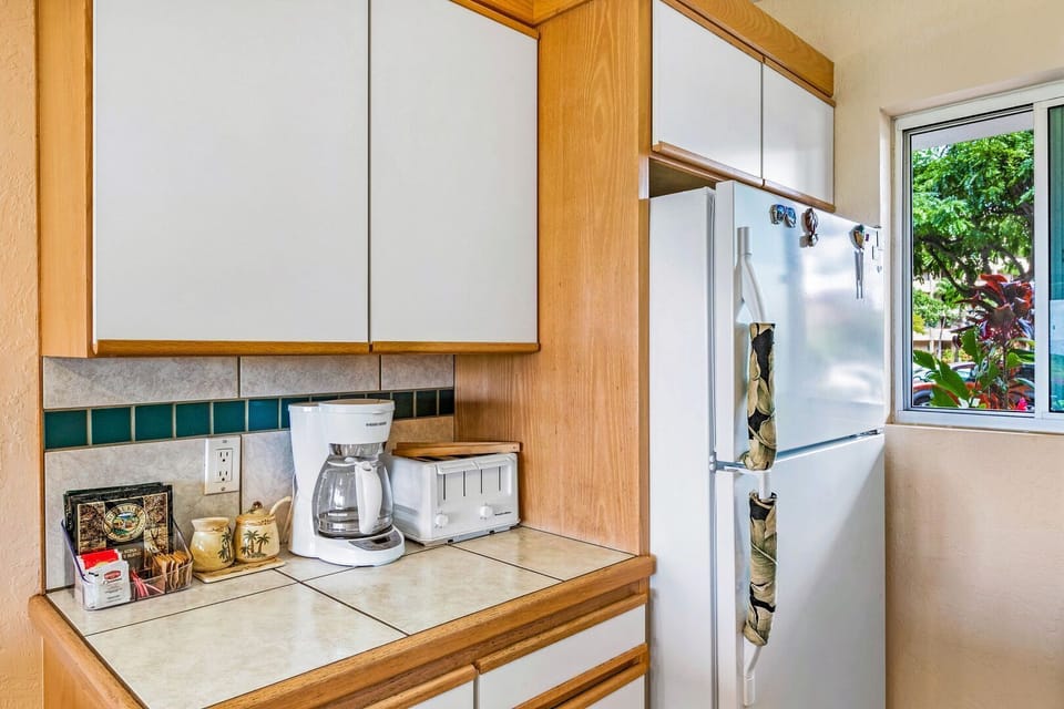 The kitchen includes a drip coffeemaker and some coffee to get the trip started.