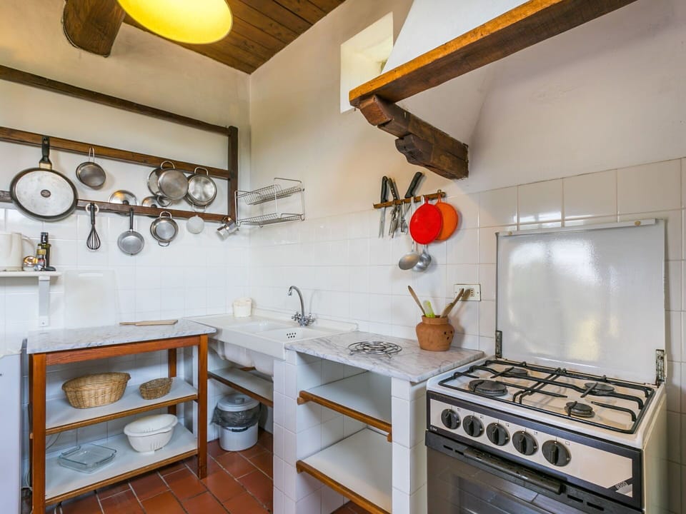 Property, Furniture, Cabinetry, Countertop, Kitchen, Kitchen Stove, Gas Stove, Kitchen Appliance, Wood, Interior Design