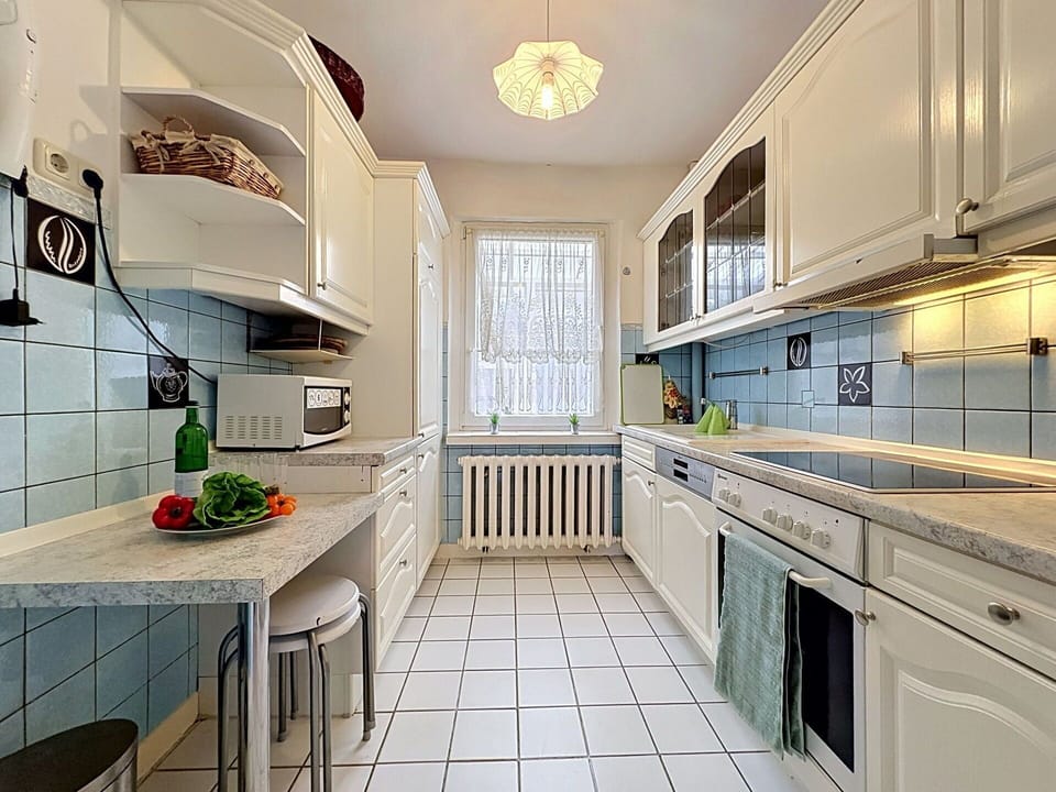 Kitchen, Countertop, Flooring, Interior Design, Cabinetry, Major Appliance, Kitchen Appliance, Floor, Ceiling, Lighting