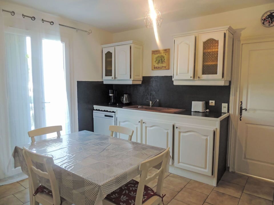 Furniture, Flooring, Interior Design, Wood, Floor, Kitchen, Countertop, Cabinetry, Room, Kitchen Appliance