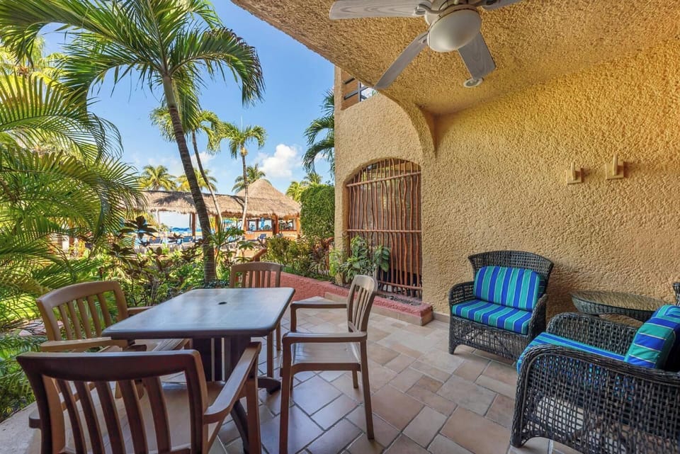First-floor condo with private patio space just steps from the pool and beach.