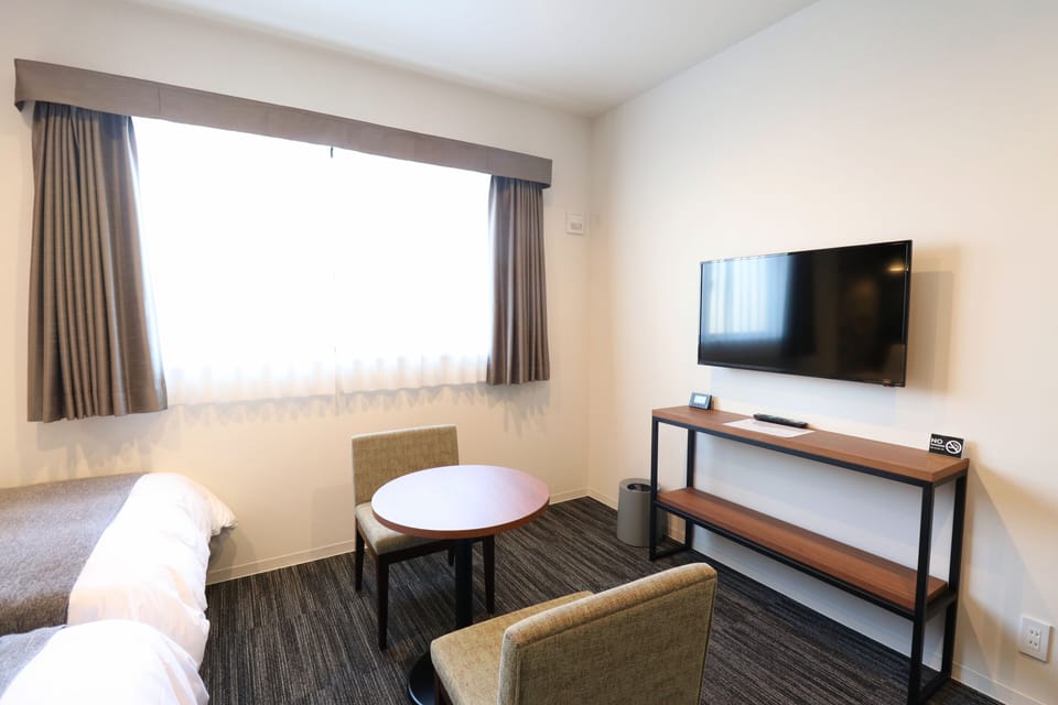 Twin Room | Iron/ironing board, free WiFi, bed sheets