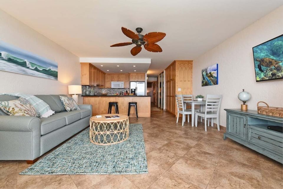 Relax in a bright living room with island flair.
