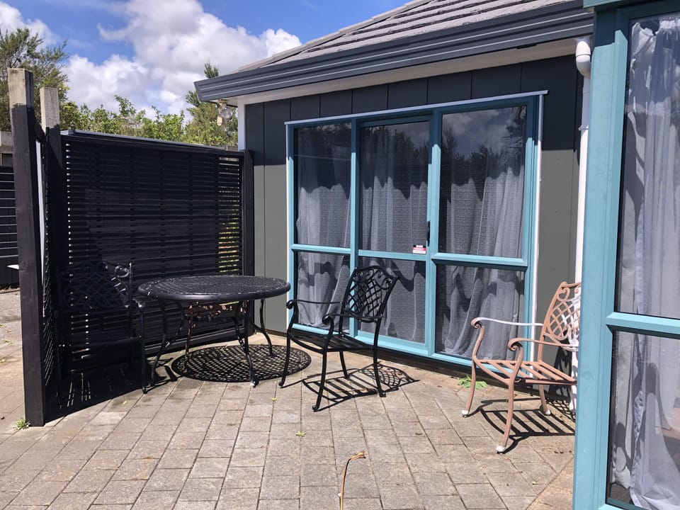 Master bedroom Ranchslider with garden patio to enjoy morning sun