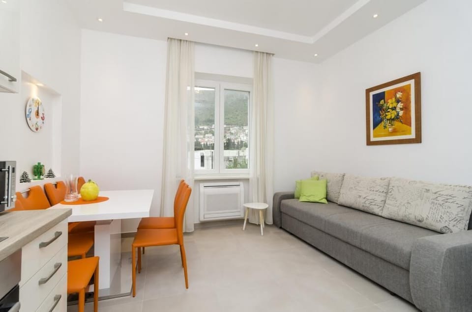 Apartment (Two Bedroom Apartment with Terrace) | Living room | 25-inch TV with cable channels