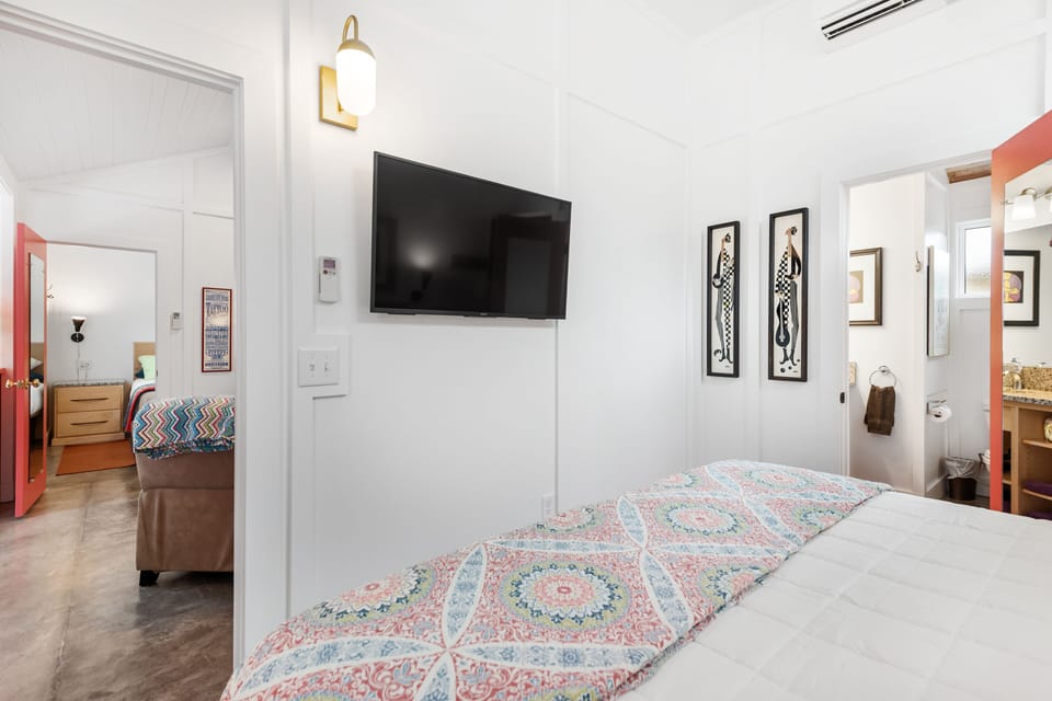 This bedroom has a King size bed and flat screen TV.