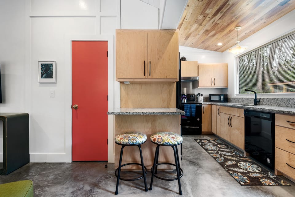 Cool smooth beautiful flooring ties these rooms together.