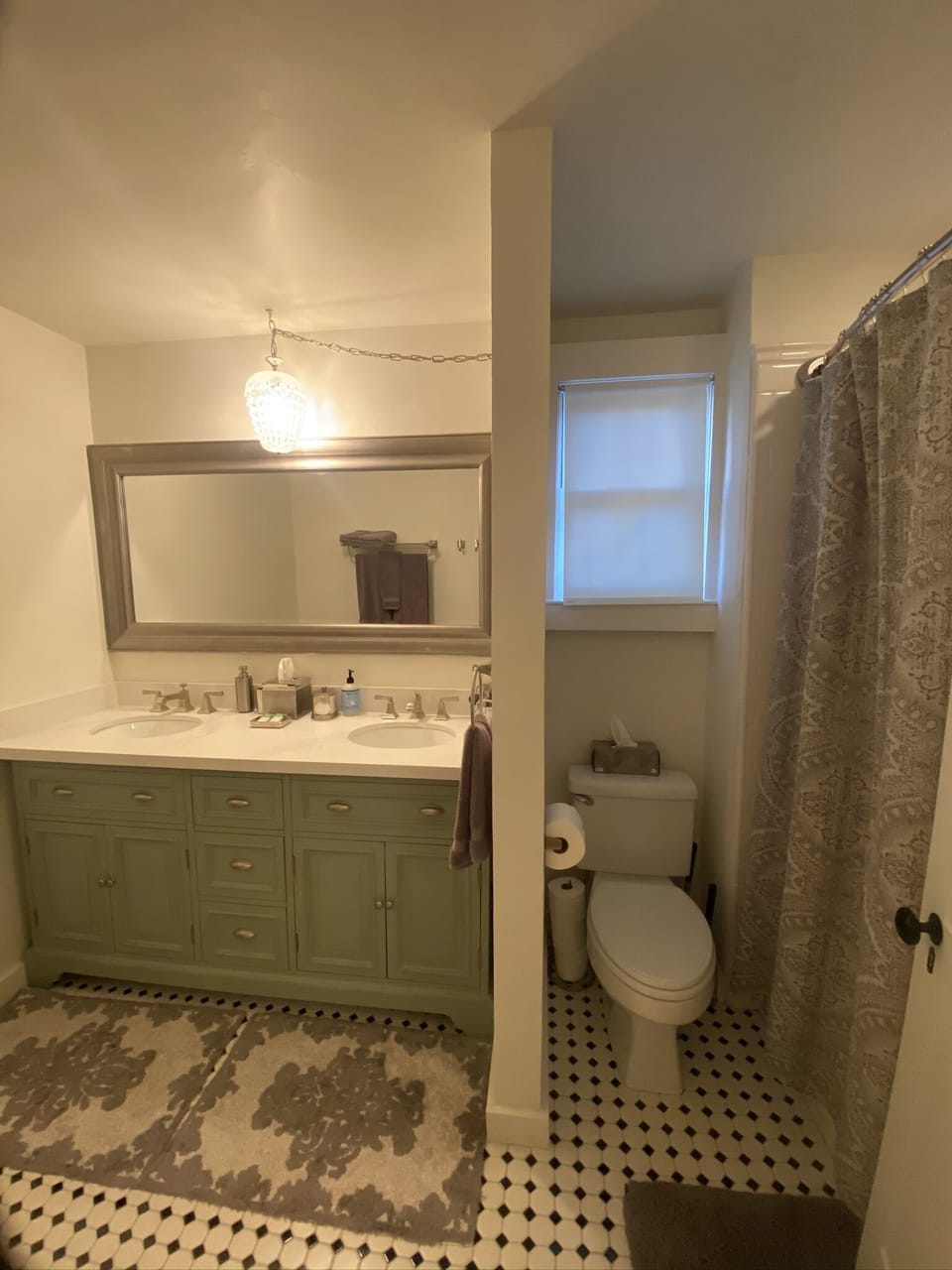Shower and tub in restored guest bedroom bath