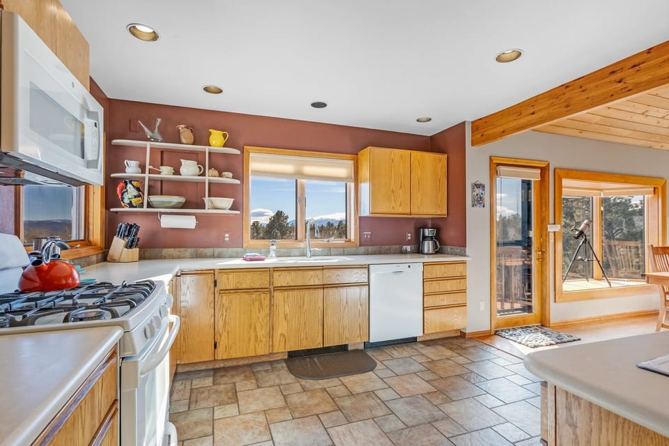 Gas Stove and Dishwasher are included in this fully stocked kitchen.  Yes, there is a crockpot!
