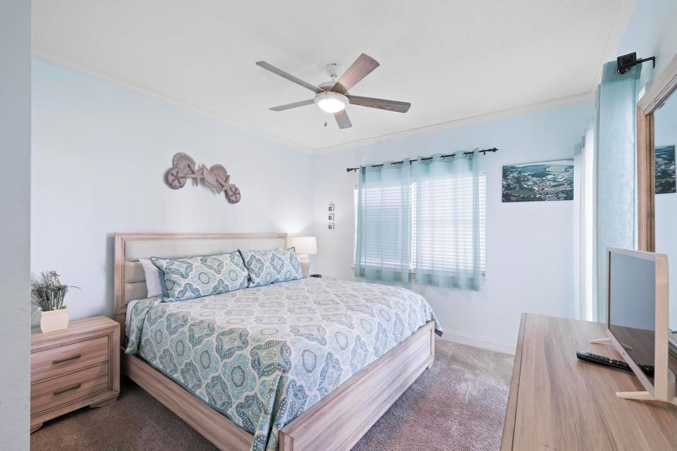 The master bedroom features a comfy king size bed and en suite bath