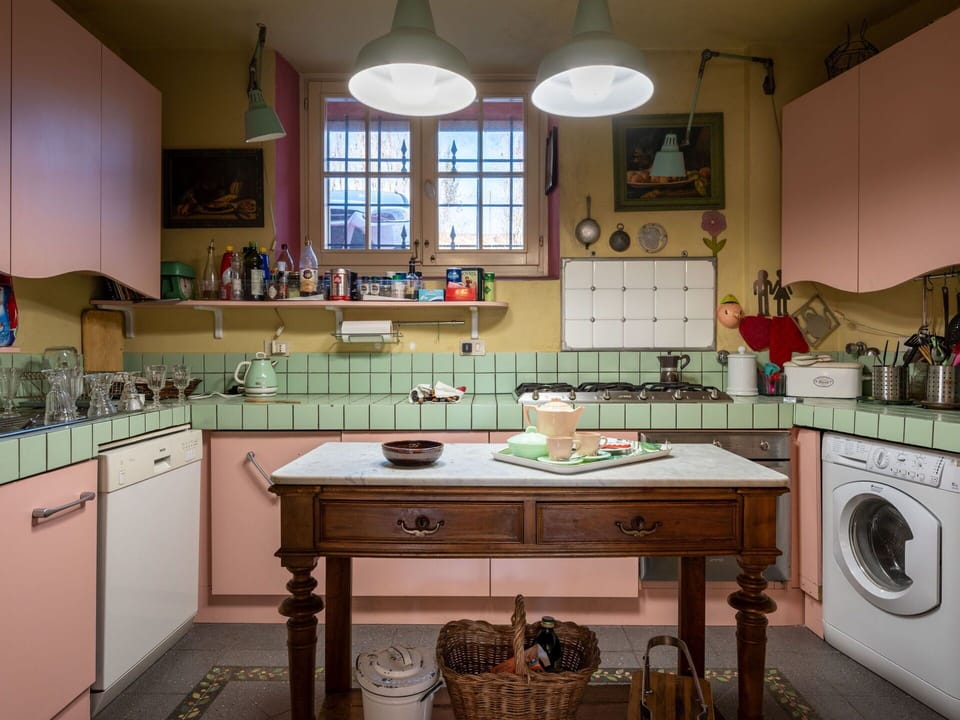 Cabinetry, Furniture, Property, Countertop, Laundry Room, Kitchen Stove, Kitchen, Gas Stove, Window, Table