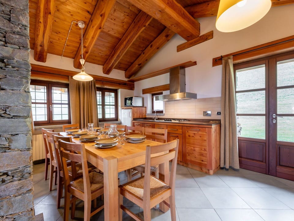 Table, Furniture, Window, Chair, Wood, Lighting, Interior Design, Cabinetry, Wood Stain, Beam