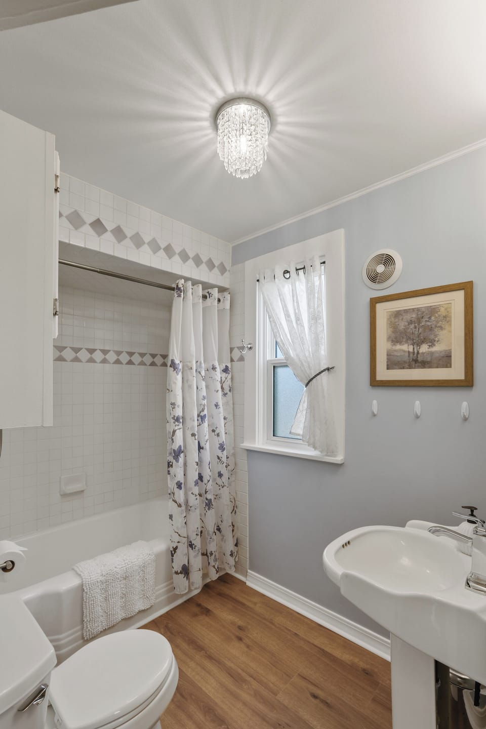 Main floor bathroom with original cast iron tub.