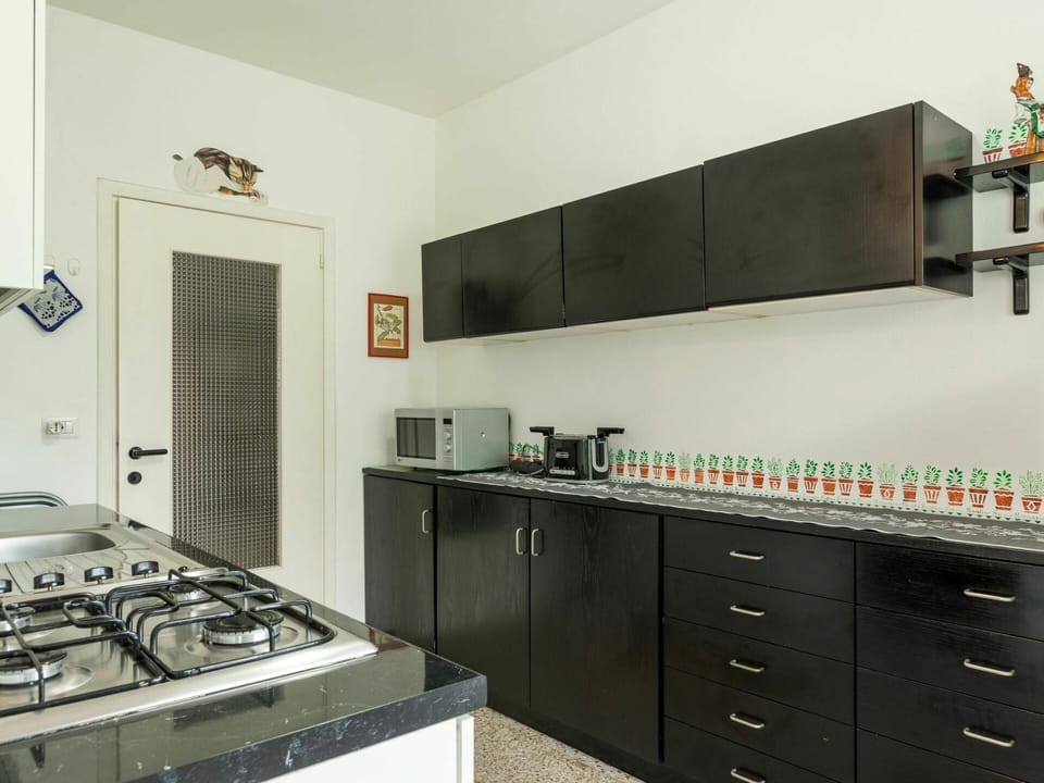 Cabinetry, Countertop, Property, White, Dresser, Drawer, Gas Stove, Kitchen, Interior Design, Wood