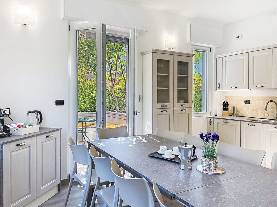 Furniture, Interior Design, Flooring, Kitchen, Chair, Home, Countertop, Kitchen & Dining Room Table, Table, Lighting