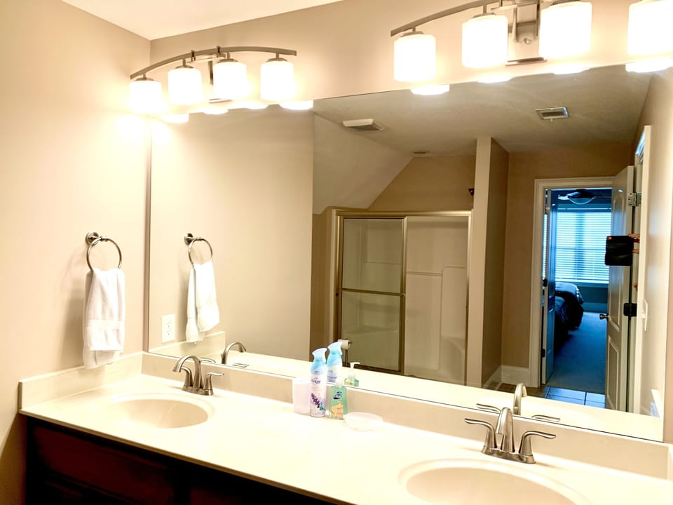 Shared bathroom for two bedrooms on second floor.
