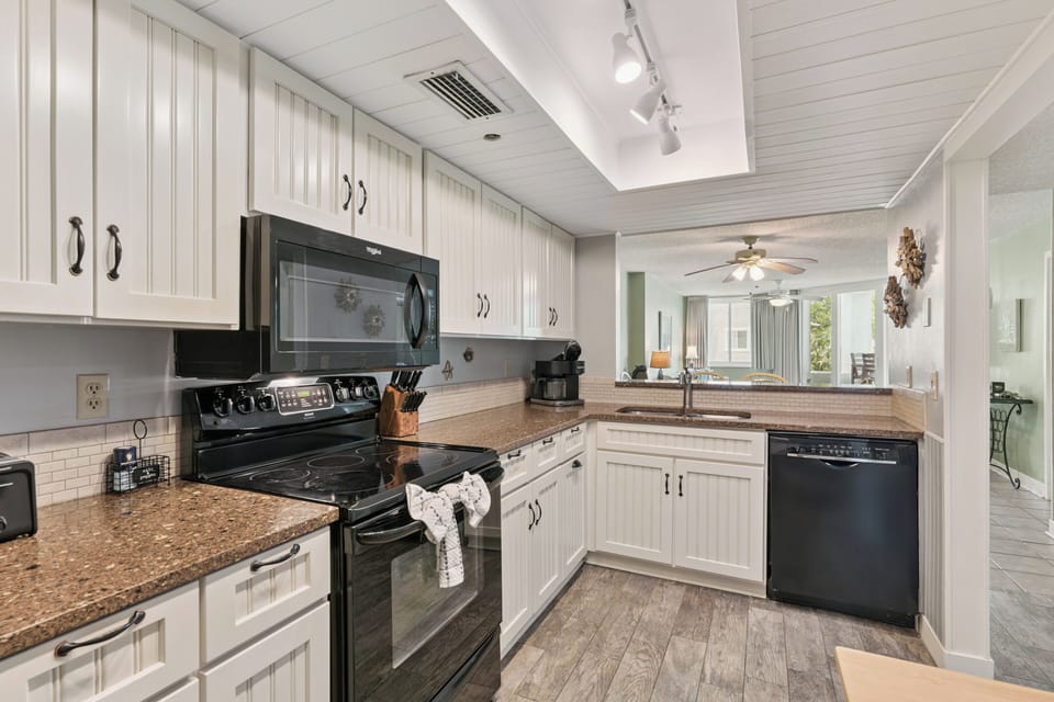 Your fully equipped kitchen features granite counters, modern appliances, and everything needed to prepare home-cooked meals during your stay.