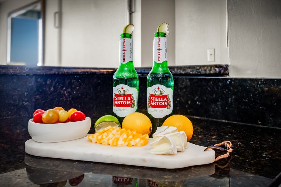 cooking in our suite's kitchen, where each meal preparation is accompanied by the ever-changing beauty of the ocean just outside the window.