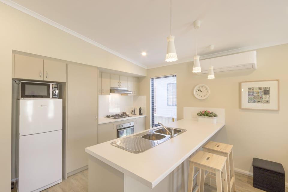 One Bedroom Holiday Home (1BR) | Private kitchen | Microwave, stovetop, electric kettle, toaster