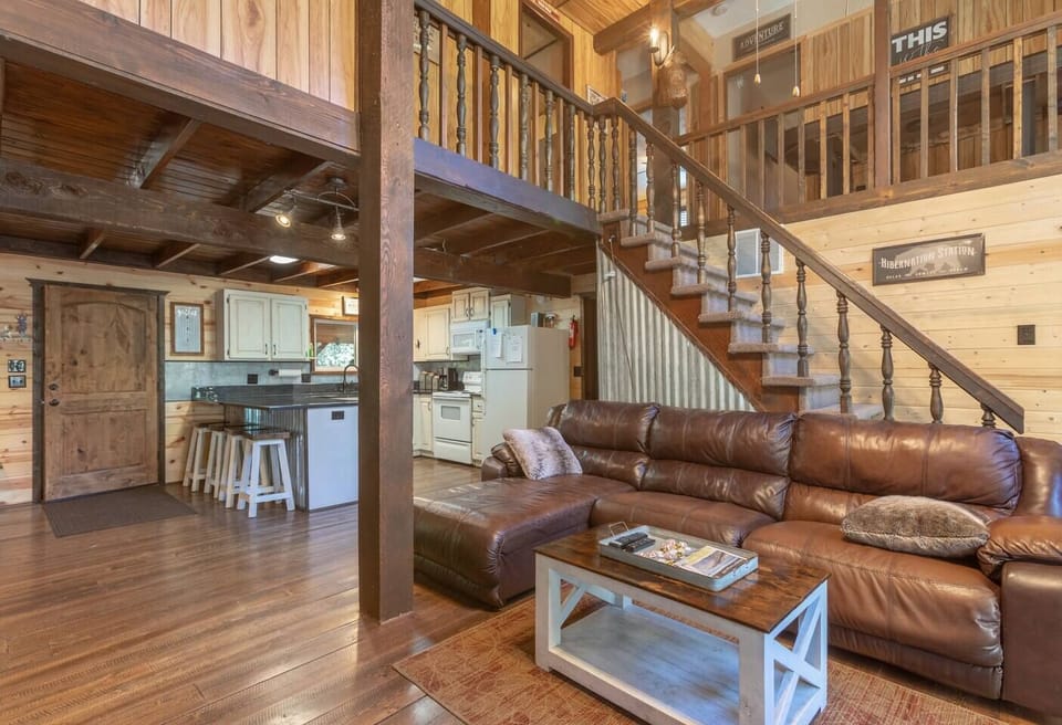 The open-concept living area feels cozy in this beautiful cabin.
